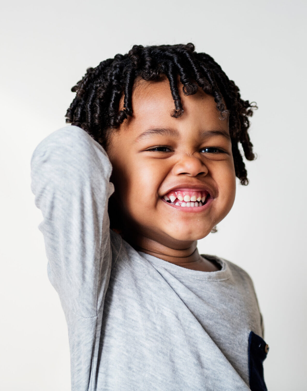 Portriat of young cheerful black boy