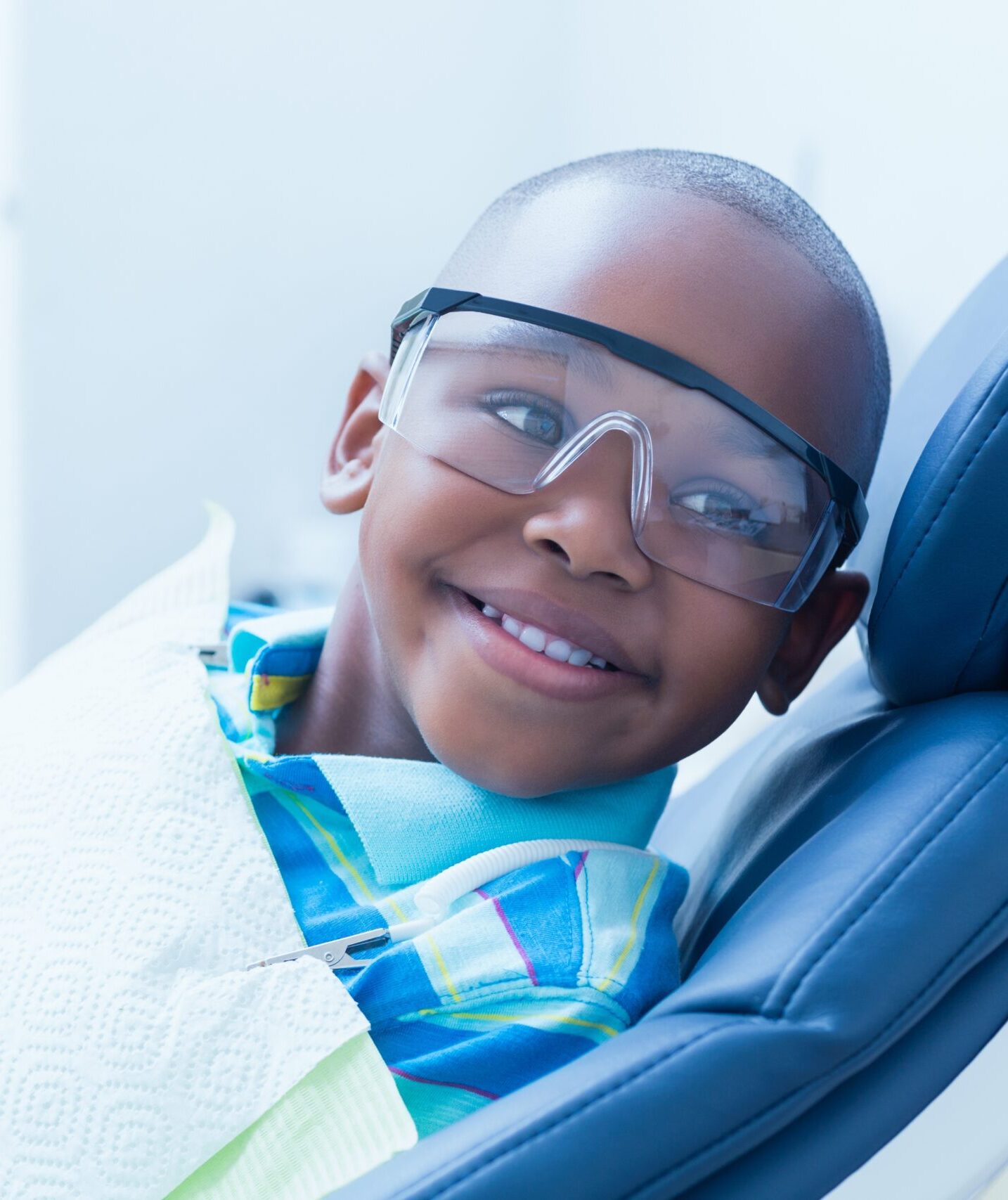 Smiling boy waiting for dental exam
